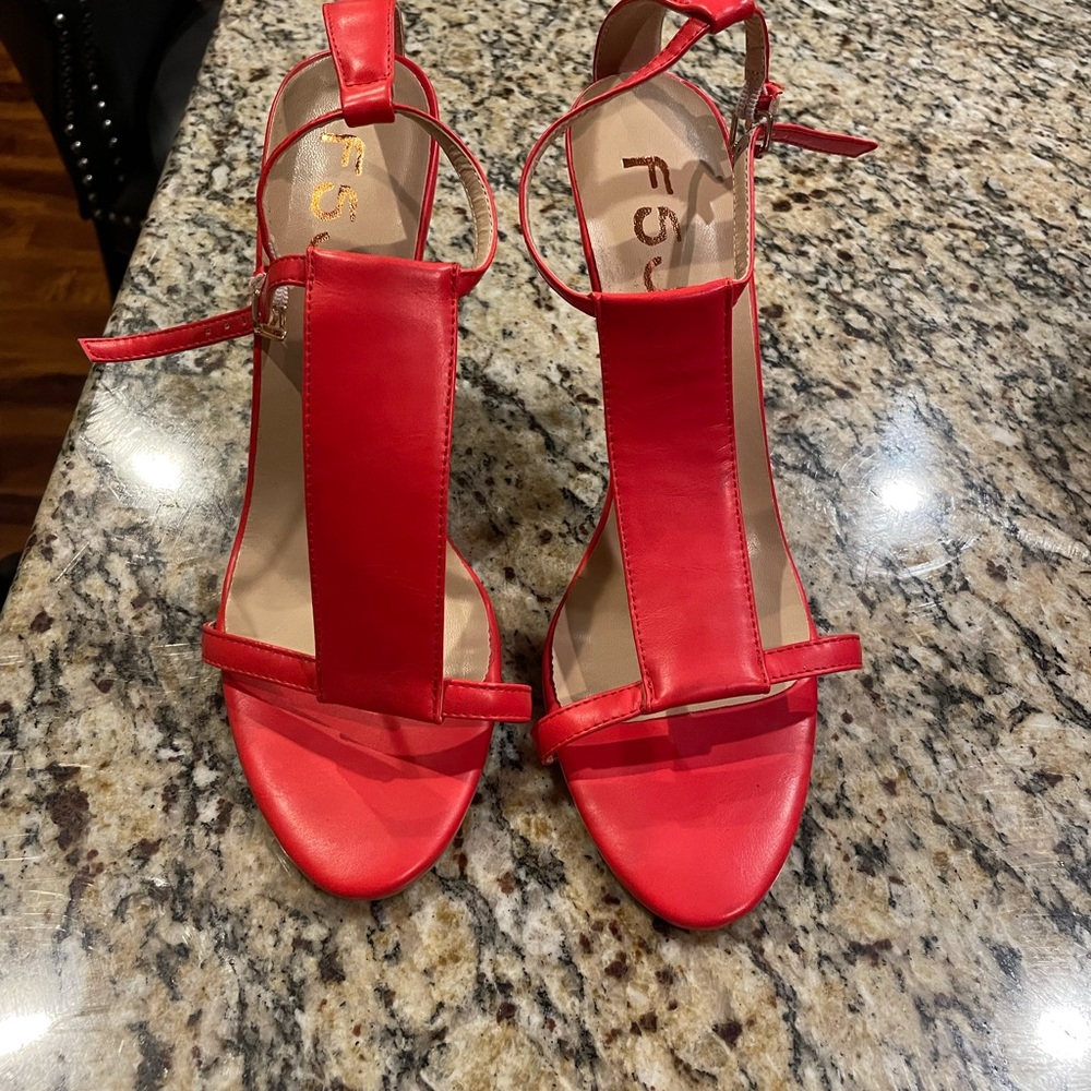 Gently used red heels